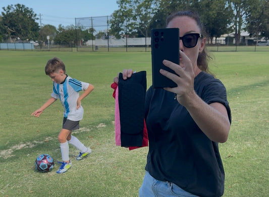 Alyce and her son Jax sharing a real life moment while filming an ad for our 2 for $99 Alpha Skins